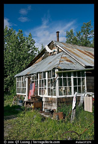 House with antlers and american flag. McCarthy, Alaska, USA