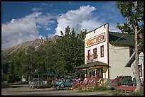 Hotel, main street, vintage car, and truck. McCarthy, Alaska, USA (color)