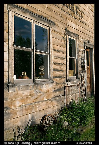 Windows and doors of old wooden building. McCarthy, Alaska, USA