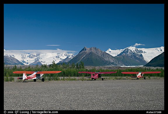 Bush planes on McCarthy airfield  and Wrangell range. McCarthy, Alaska, USA (color)