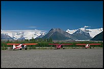 Bush planes on McCarthy airfield  and Wrangell range. McCarthy, Alaska, USA