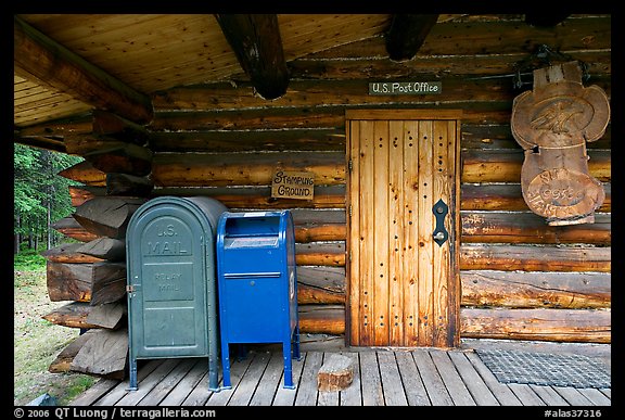 Mail boxes, log house post office, Slana. Alaska, USA (color)