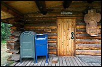 Mail boxes, log house post office, Slana. Alaska, USA (color)
