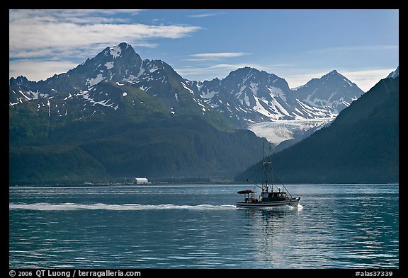 Fishing boat, mountains and glaciers. Seward, Alaska, USA