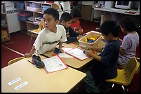 Inupiaq Eskimo kids in the classroom. Note names on table. Kiana. North Western Alaska, USA ( color)