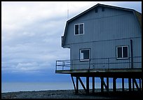 Watefront house on stilts on the Spit. Homer, Alaska, USA