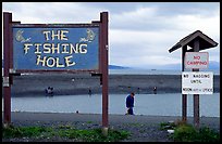 Fishing Hole signs. Homer, Alaska, USA (color)