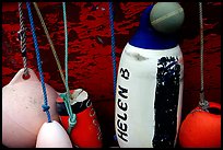 Buoys hanging on the side of a boat. Homer, Alaska, USA