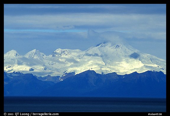 Mt Iliamna, a volcano in Lake Clark National Park, seen across the Cook Inlet. Ninilchik, Alaska, USA