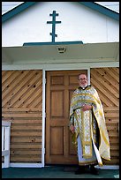 Orthodox priest ouside the old Russian church. Ninilchik, Alaska, USA