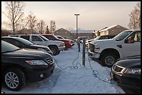 Cars with block engine heaters connected to plugs. Fairbanks, Alaska, USA