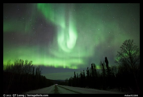 Aurora curtains above road. Alaska, USA (color)