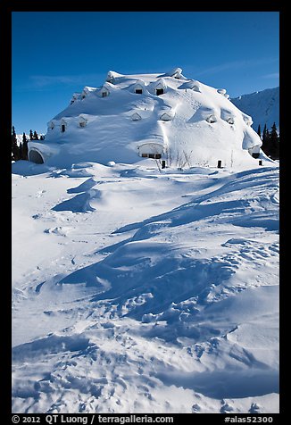 Igloo-shaped building covered with snow. Alaska, USA (color)