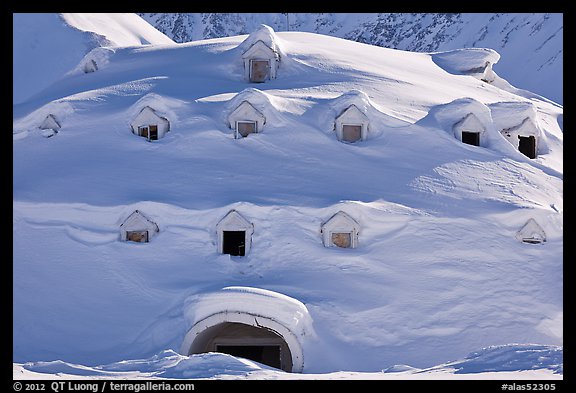 Snow-covered igloo-shaped building. Alaska, USA