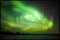 Magnetic storm in sky above snowy meadow. Alaska, USA (color)