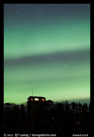 Hilltop house and Aurora Borealis. Alaska, USA (color)