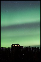 Hilltop house and Aurora Borealis. Alaska, USA ( color)