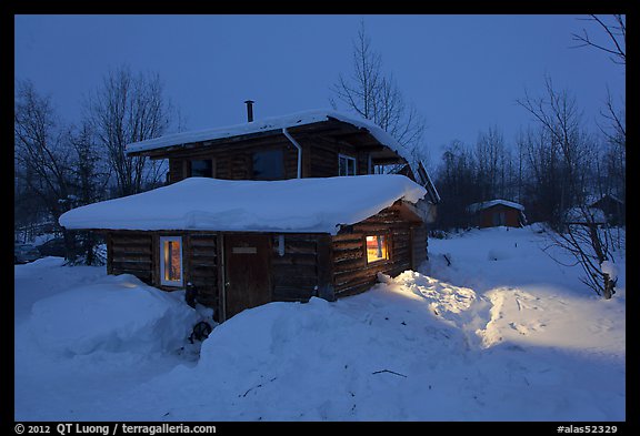 Log cabin at night. Wiseman, Alaska, USA (color)