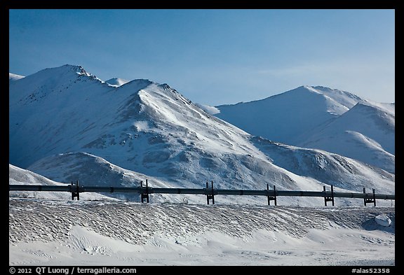 Trans Alaska Pipeline and snow-covered mountains. Alaska, USA (color)