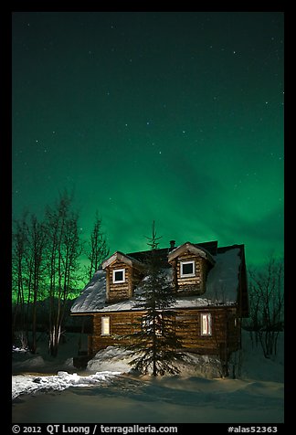 Cabin at night with Northern Lights. Wiseman, Alaska, USA