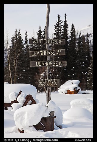 Signs in winter. Wiseman, Alaska, USA (color)