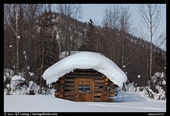 Snow-covered cabin. Wiseman, Alaska, USA