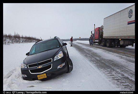 Car stuck in snow along Dalton Highway. Alaska, USA