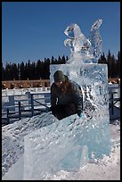 Girl on ice sculpture, George Horner Ice Park. Fairbanks, Alaska, USA ( color)