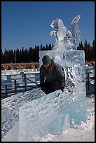 Girl on ice sculpture, George Horner Ice Park. Fairbanks, Alaska, USA (color)