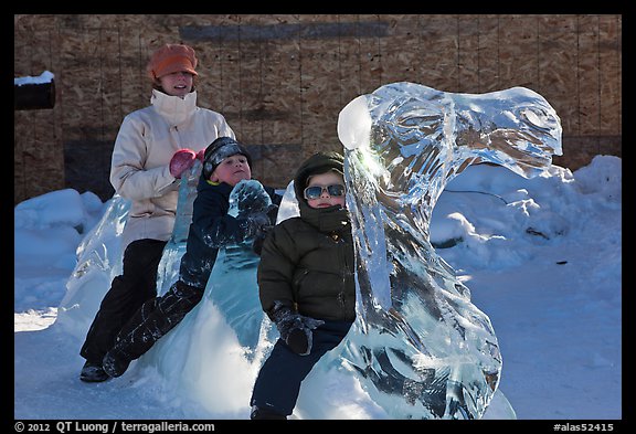 Family riding camel carved out of ice. Fairbanks, Alaska, USA (color)