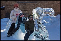 Family riding camel carved out of ice. Fairbanks, Alaska, USA ( color)