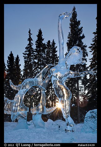 Sun setting over ice sculpture, World Ice Art Championships. Fairbanks, Alaska, USA