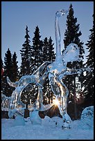 Sun setting over ice sculpture, World Ice Art Championships. Fairbanks, Alaska, USA ( color)