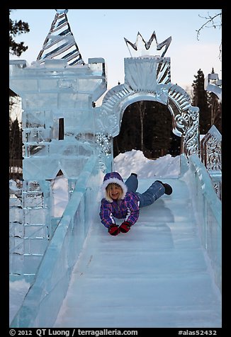 Girl on ice slide, Ice Alaska. Fairbanks, Alaska, USA (color)