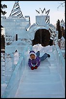 Girl on ice slide, Ice Alaska. Fairbanks, Alaska, USA (color)