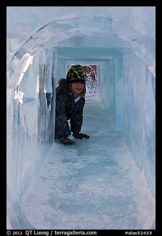 Girl inside ice tunnel, Ice Alaska. Fairbanks, Alaska, USA