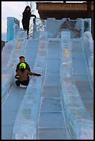 Lights come up inside ice slide at dusk. Fairbanks, Alaska, USA ( color)