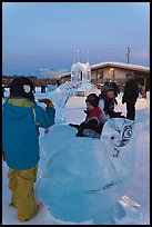 Children playing on ice sculptures, Ice Alaska. Fairbanks, Alaska, USA ( color)