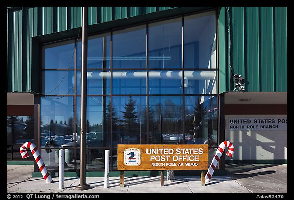 Post office sign with candy stripped canes. North Pole, Alaska, USA (color)