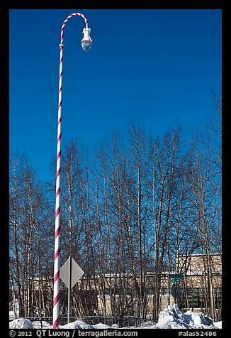 Street light decorated with a candy cane motif. North Pole, Alaska, USA (color)