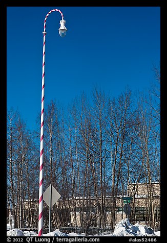 Street light decorated with a candy cane motif. North Pole, Alaska, USA (color)