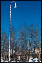 Street light decorated with a candy cane motif. North Pole, Alaska, USA (color)