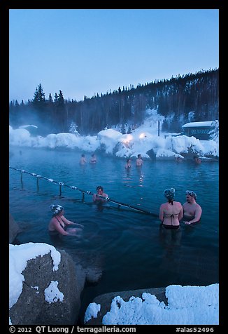 People soak in natural hot springs in winter. Chena Hot Springs, Alaska, USA (color)