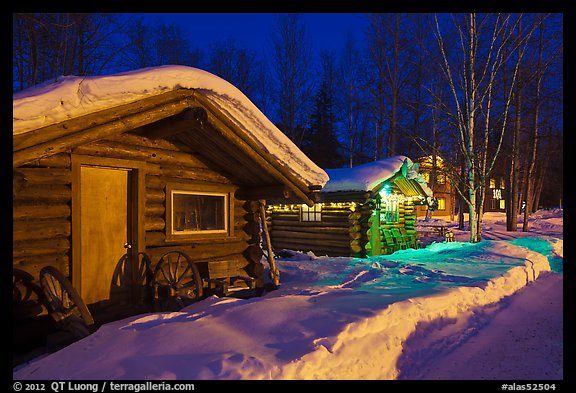 Cabins at night in winter. Chena Hot Springs, Alaska, USA (color)