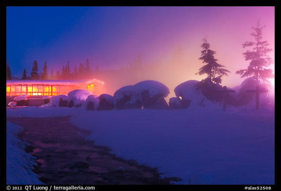 Stream, steam, and bathhouse at night. Chena Hot Springs, Alaska, USA