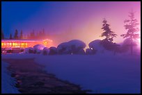 Stream, steam, and bathhouse at night. Chena Hot Springs, Alaska, USA