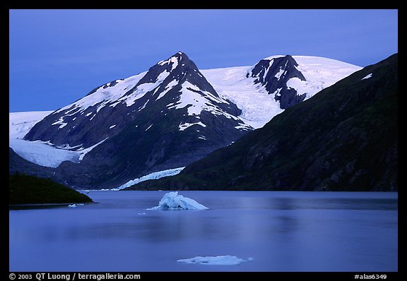 Icebergs in Portage Lake at dusk. Alaska, USA (color)