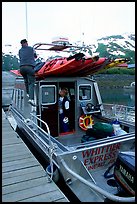 Kayaks loaded on a water taxi in Whittier. Whittier, Alaska, USA (color)