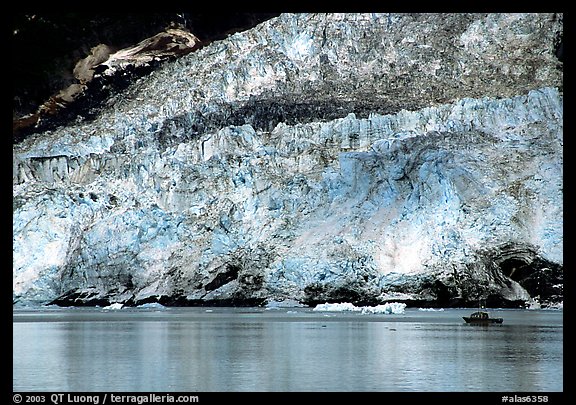 Boat at the base of Barry Glacier. Prince William Sound, Alaska, USA