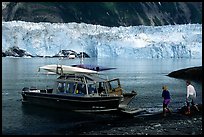 Water taxi boats lands on Black Sand Beach. Prince William Sound, Alaska, USA (color)